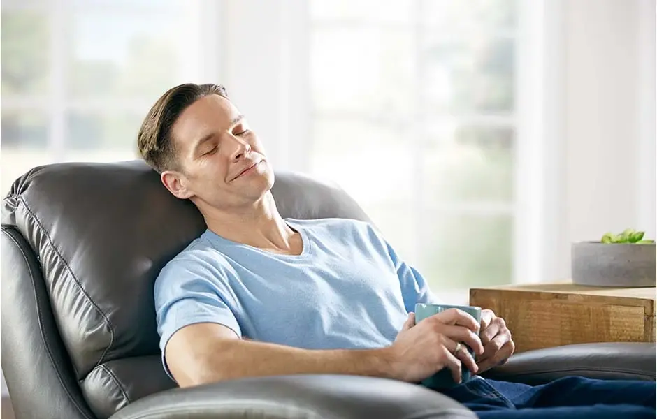 Man relaxing in a reclining chair.